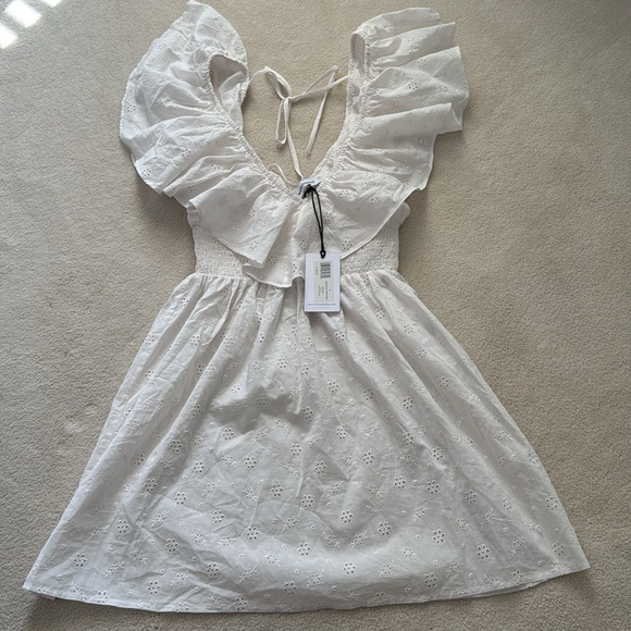 White eyelet V-Neck ruffle mini, smocked waist by “WeWoreWhat”. New w/tags - Picture 2 of 6
